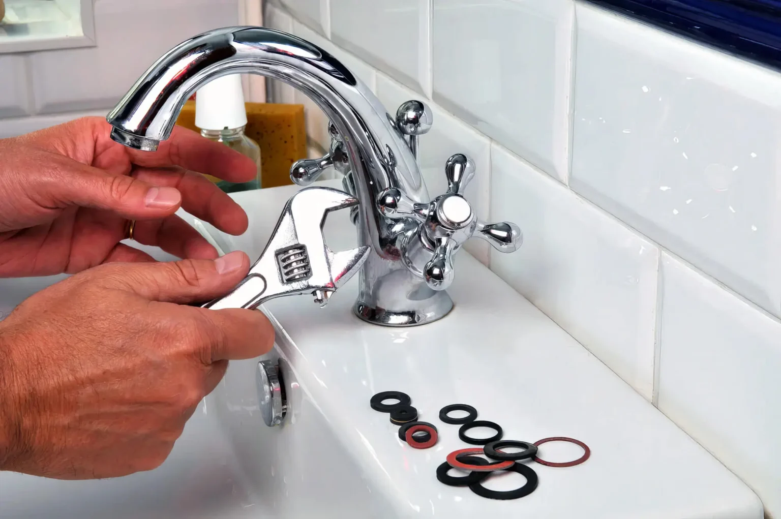 Plumber maintaining a bathroom faucet in Sacramento